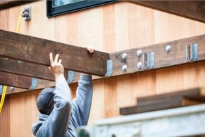 Worker building a deck