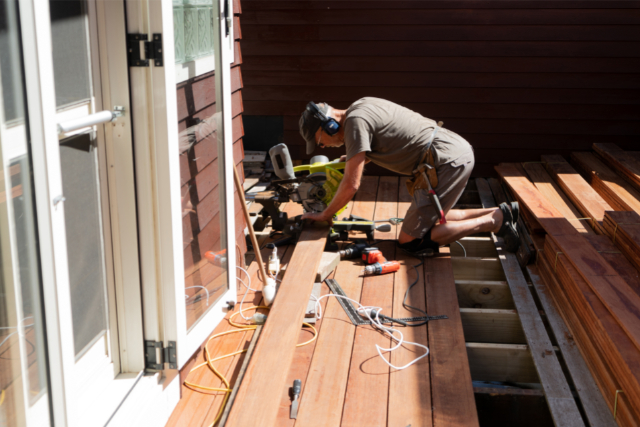 Worker building a deck